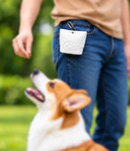 ZippyTreat™ treat pouch clipped to a belt during dog training
